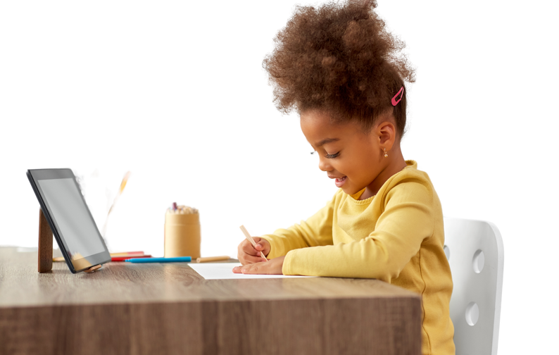 Little Girl Drawing with Pencils at Home